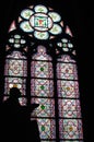 Silhouette of statue praying in the window of the cathedral