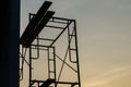 Silhouette steel scaffolding with twilight sky background at the construction site