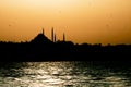 Silhouette of Suleymaniye Mosque at sunset. Ramadan and kandil background photo