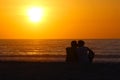 Silhouette sunrise kiss on the beach Royalty Free Stock Photo