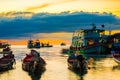 Silhouette sunset boat on sea beach colorful sky with cloud