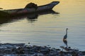 Silhouette at sunset of canoes docked in the grandiose Paraguacu river