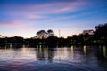 Silhouette sunset in the evening the tree is shadows dark. There are ponds that reflect light Blue sky and clouds Royalty Free Stock Photo