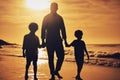 Silhouette, sunset and father holding hands with children at the beach for walking, bonding and vacation. Dark, care and Royalty Free Stock Photo