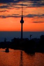 Silhouette at sunset of the Fernsehturm Royalty Free Stock Photo