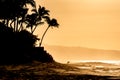 Silhouette of a surfer in the distance at sunset on Sunset Beach, Hawaii Royalty Free Stock Photo