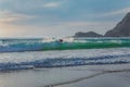 Silhouette Of surfer people on sunset beach catch oceans wave.Surfing sport and travel concept