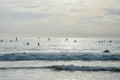 Silhouette Of surfer people on sunset beach catch oceans wave.Surfing sport and travel concept