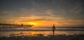 Silhouette surfer at sunset Imperial Beach Pier Royalty Free Stock Photo