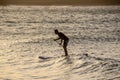 Silhouette Surfer at Sunset