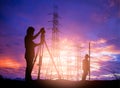 Silhouette survey engineer working in a building site over Blur