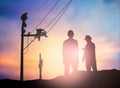 Silhouette survey engineer working in a building site over Blur