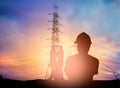 Silhouette survey engineer working in a building site over Blur