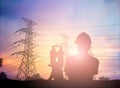 Silhouette survey engineer working in a building site over Blur Royalty Free Stock Photo