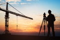 Surveyor Standing With Equipment At Construction Site Royalty Free Stock Photo