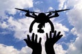 Silhouette takeoff drone of human hands