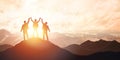 Silhouette of the team on the peak of mountain Royalty Free Stock Photo