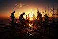 Silhouette teamwork Construction engineer, contractor, civil team at sunset site
