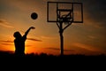 Silhouette of a Teen Boy shooting a Basketball