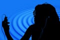 Silhouette of Teen with Digital Video Player Royalty Free Stock Photo