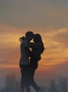 Silhouette teen lovers in romantic scene