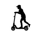 Silhouette teenage boy riding scooter Royalty Free Stock Photo