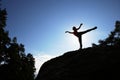 Silhouette Of Teenage Girl Balancing