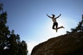 Silhouette Of Teenage Girl Leaping In Air