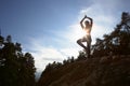 Silhouette Of Teenage Girl Meditating Outdoors