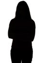 Silhouette of teenager with arms crossed