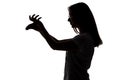 Silhouette of teenager girl making shadows play Royalty Free Stock Photo