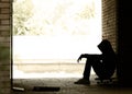 Silhouette of a Teenager on a Skateboard in a Gateway