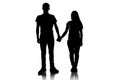 Silhouette of teenagers holding hands