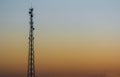 Silhouette of telecommunications tower at sunset Royalty Free Stock Photo