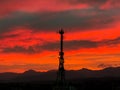 Silhouette of telecommunications tower at sunset Royalty Free Stock Photo