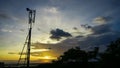 Silhouette of the telephone antenna at sunrise Royalty Free Stock Photo