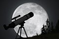 Silhouette of telescope and big moon in background. Astronomy and exploration of universe concept. Royalty Free Stock Photo