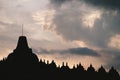 A silhouette temple under vanilla sky