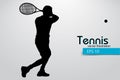 Silhouette of a tennis player.