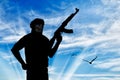 Silhouette of a terrorist with a weapon