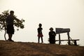 Silhouette of thai family people travel on top of Phu Pa Po mountain or Fuji City Loei