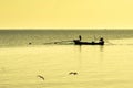 Silhouette Thai Fisherman going on ocean on traditional fishing