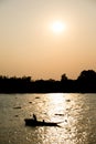 Silhouette of Thai Fishing Boat with sunset Royalty Free Stock Photo