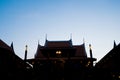 Silhouette Thai house and blue sky background.