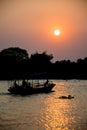 Silhouette of a Thai passenger ship on sunset Royalty Free Stock Photo