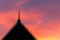 Silhouette Thai style temple roof and sunset