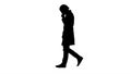 Silhouette Thoughtful male doctor walking. Royalty Free Stock Photo