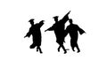 Silhouette Three male graduates in robes and mortarboards dancin