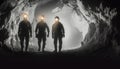 Silhouette of Three Miners with Headlamps, Embarking into a Dark Underground Coal Mine Royalty Free Stock Photo