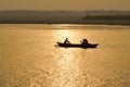 Silhouette tourist boats at Ganges river in Varanasi, India at sunrise